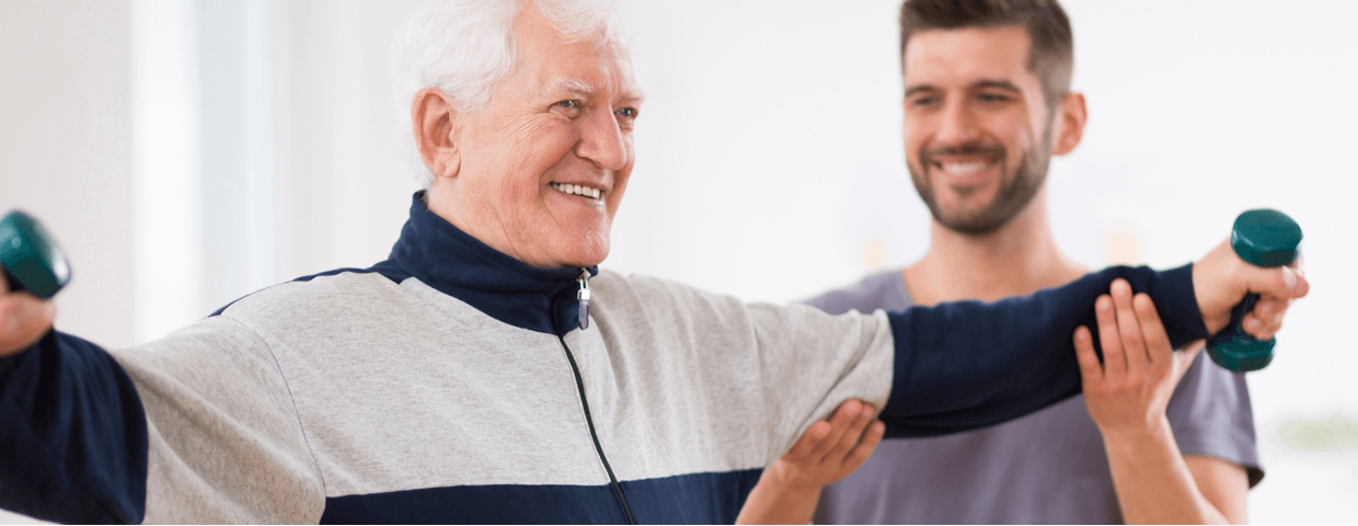 senior man doing physical therapy or cardiac rehab with a trainer after heart surgery senior man doing physical therapy or cardiac rehab with a trainer after heart surgery