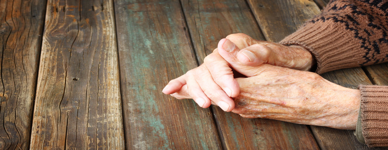old womans resting hands old womans resting hands
