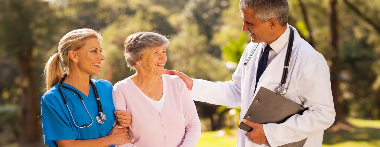 recovering patient with medical professionals recovering patient with medical professionals